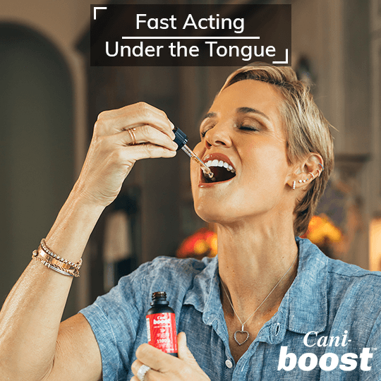 Alt=“Dara Torres using placing CBD oil for focus and energy in her mouth